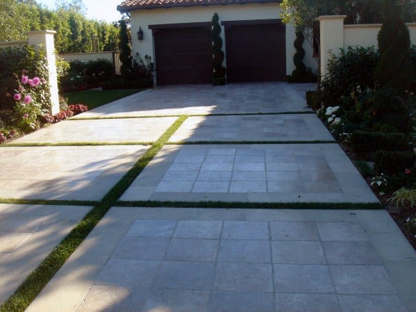 concrete paver driveway with grass joints