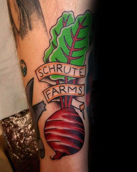 Color tattoo of a beet with a banner reading "Schrute Farms," referencing Dwight Schrute’s family farm from The Office.