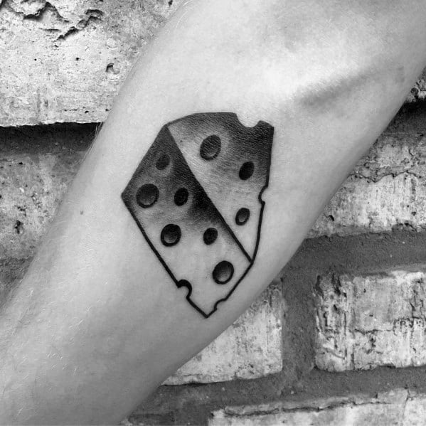 Black and gray tattoo of a wedge of Swiss cheese with a diagonal shading split, featuring bold outlines and a minimalist geometric design.