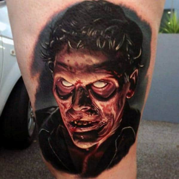 Realistic color tattoo of an eerie undead figure with glowing eyes, decayed flesh, and dark shading for a haunting and intense horror design.