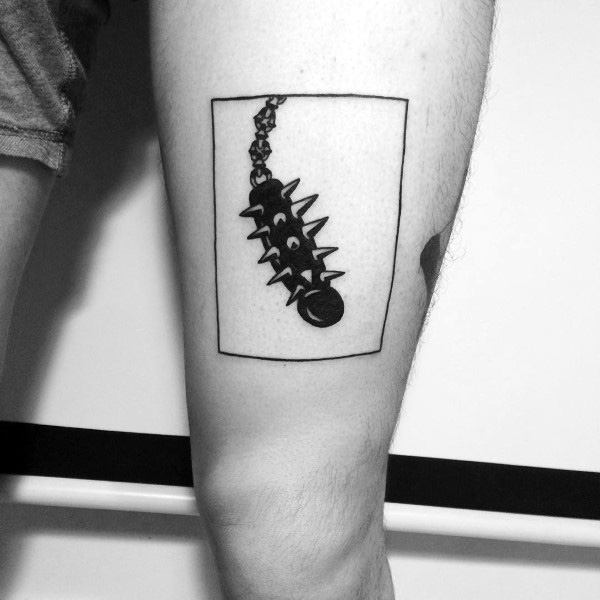 Minimalist black ink mace tattoo within a rectangular frame, featuring a spiked weapon hanging from a chain, symbolizing power and toughness.