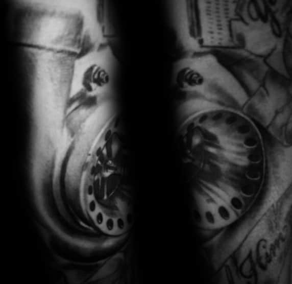 Realistic turbocharger tattoo with fine shading and mechanical details, symbolizing speed, power, and a passion for automotive engineering.