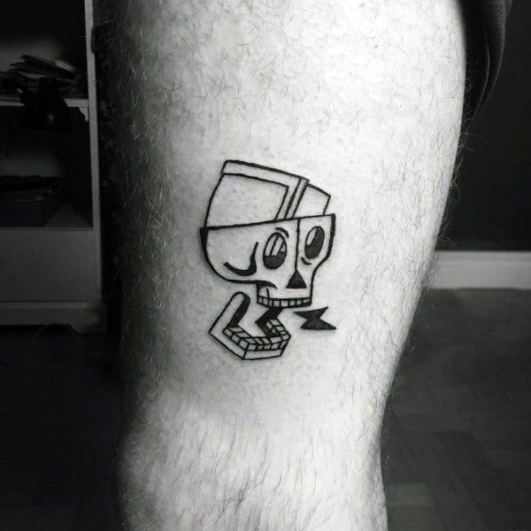 Minimalist black ink tattoo of a stylized skull with a vintage TV screen on top, featuring bold lines and a cartoonish expression.