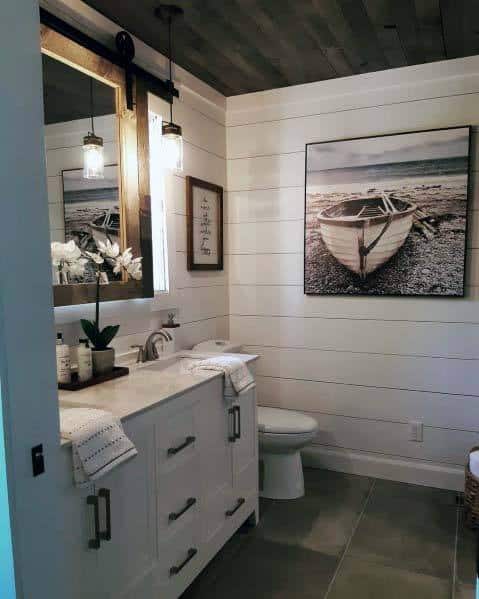 white shiplap bathroom white vanity with black handles pendant light
