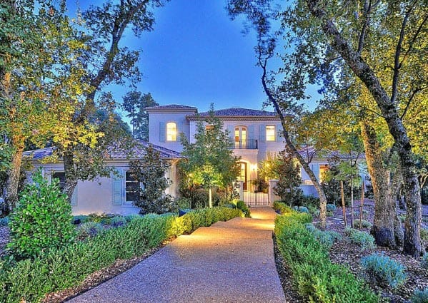 tree-lined front yard walk path