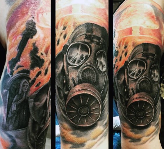 Explosion Fire Mens Gask Mask Tattoo On Upper Arm