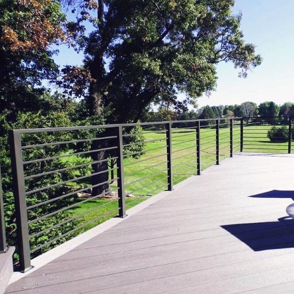 wood deck with black metal railing