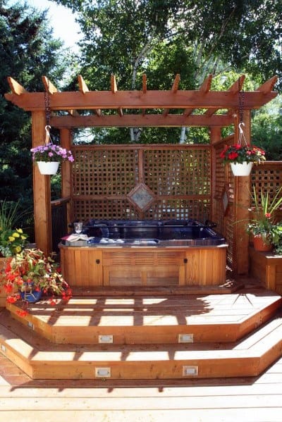 wood deck pergola hot tub hanging plants