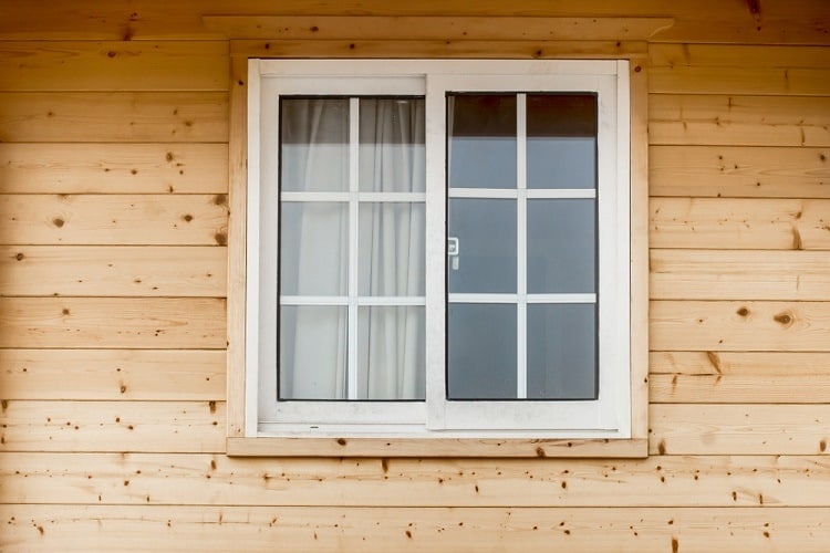 exterior wooden window trim in white