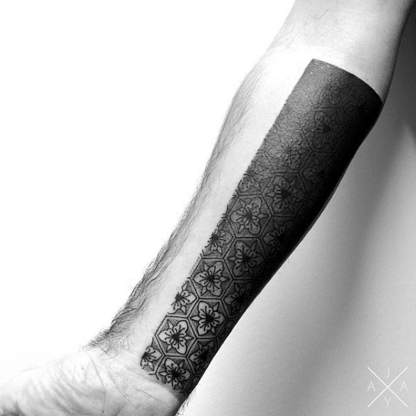 Fading Black Pattern Tattoo Male Forearms