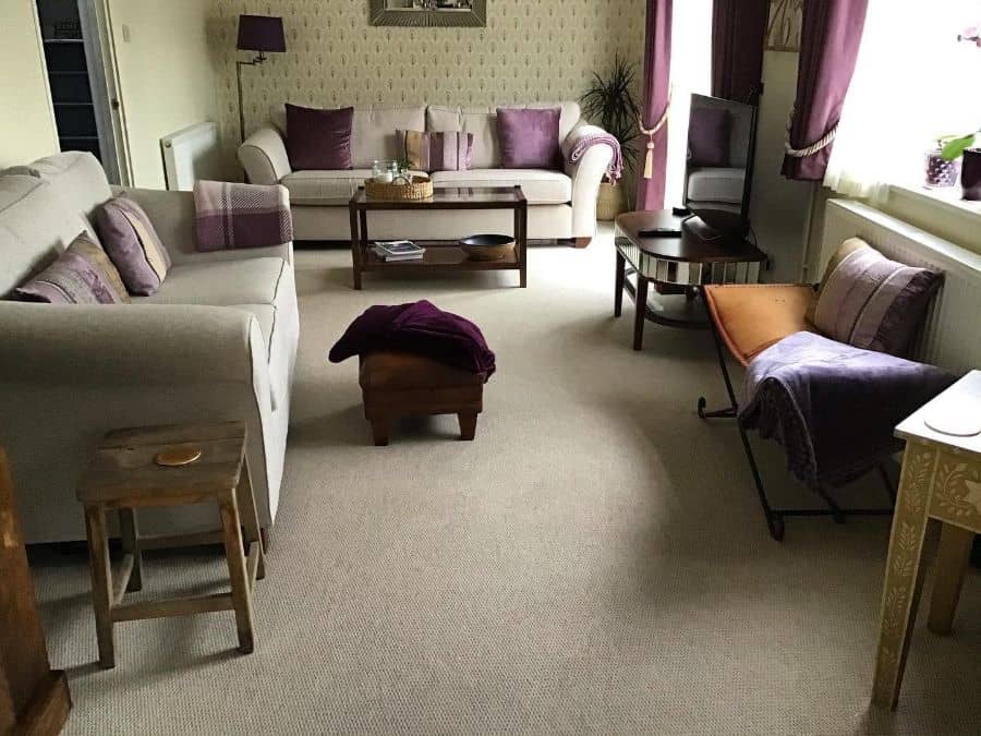 large family room white sofa pink accents