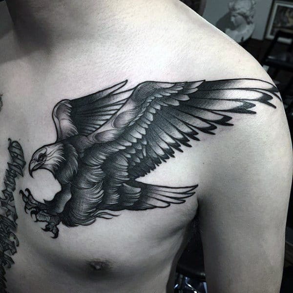 Fantastic Black Bald Eagle Tattoo On Mans Chest