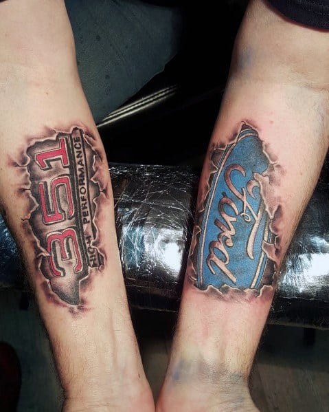 Ford-themed ripped-skin tattoos on forearms, featuring a blue Ford logo on one arm and "361 High Performance" text with a torn effect on the other.