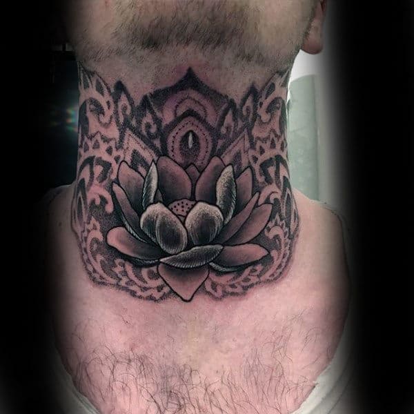 Throat tattoo featuring a detailed black and gray lotus flower with intricate mandala-style patterns for a bold and spiritual design