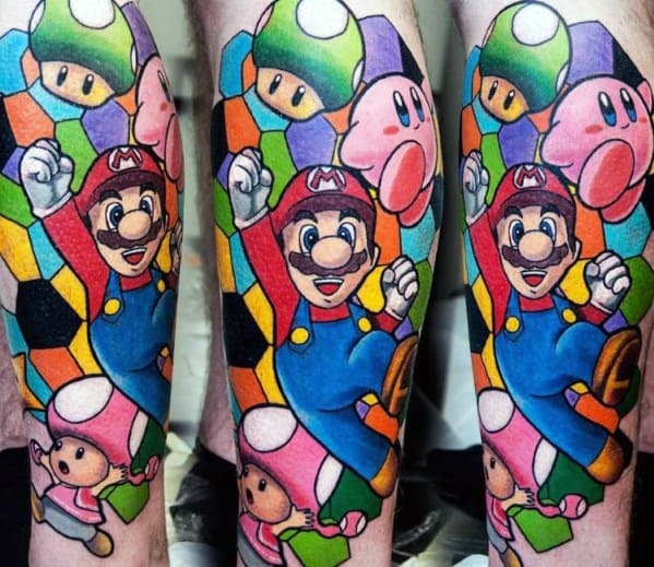 Bright and colorful Mario tattoo featuring a stained-glass effect with Toad, Kirby, and power-ups, creating a vibrant, playful gaming design.