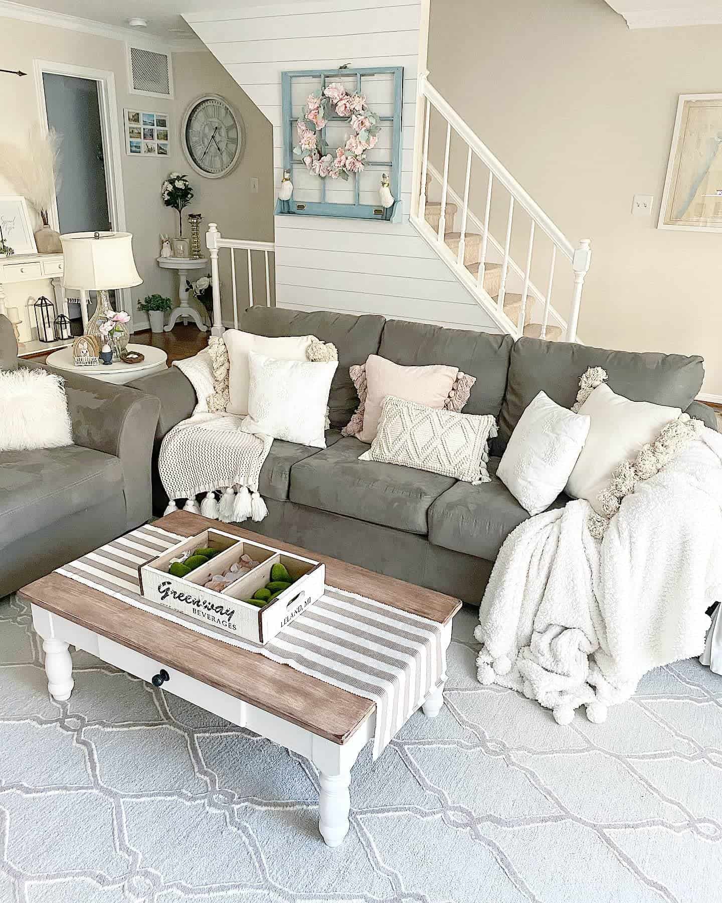 farmhouse chic living room gray sofa shiplap wall beige colors wood coffee table 