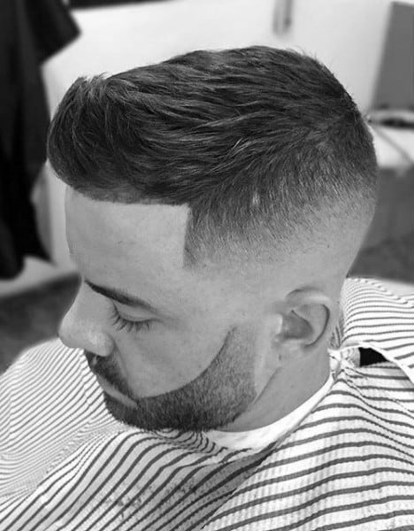 Fashionable Faux Hawk Fade Taper Hairstyle For Males