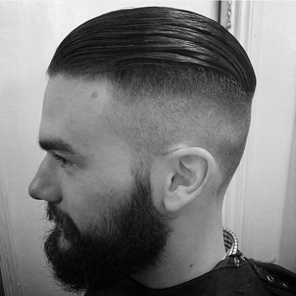 Fashionable Slicked Back Undercut Hair For Men With High Fade
