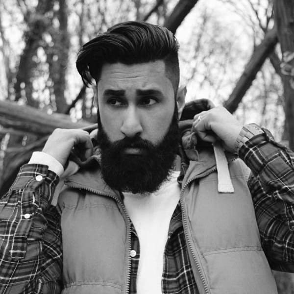 Fashionable Thick Medium Undercut Hair For Gentlemen With Beards