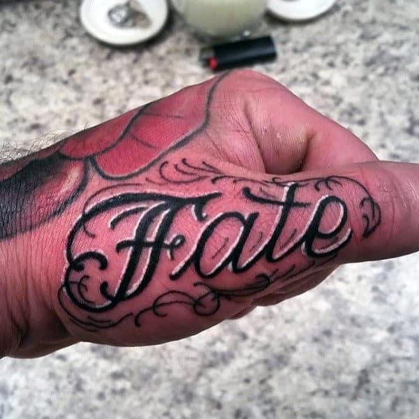 Fate Lettering Black And White Ink Thumb Tattoos On Man