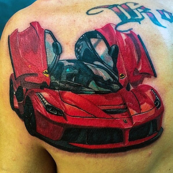Bold tattoo of a red Ferrari with open butterfly doors on man's shoulder, symbolizing style, luxury, and automotive excellence.