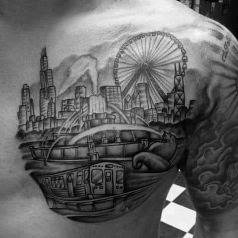 Black and grey Chicago-themed tattoo featuring a Ferris wheel, city skyline, riverboat, and train, creating a detailed urban landscape on the chest.