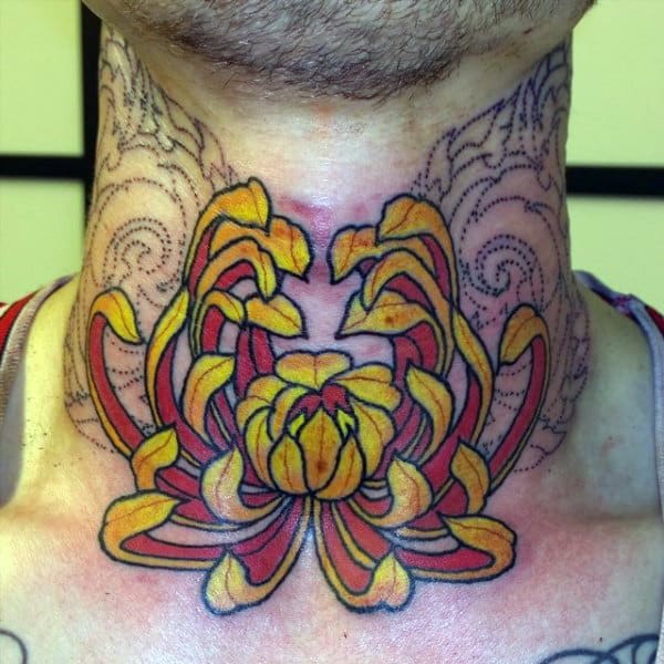 Throat tattoo of a bold red and yellow chrysanthemum with flowing petals, accented by intricate linework extending up the neck