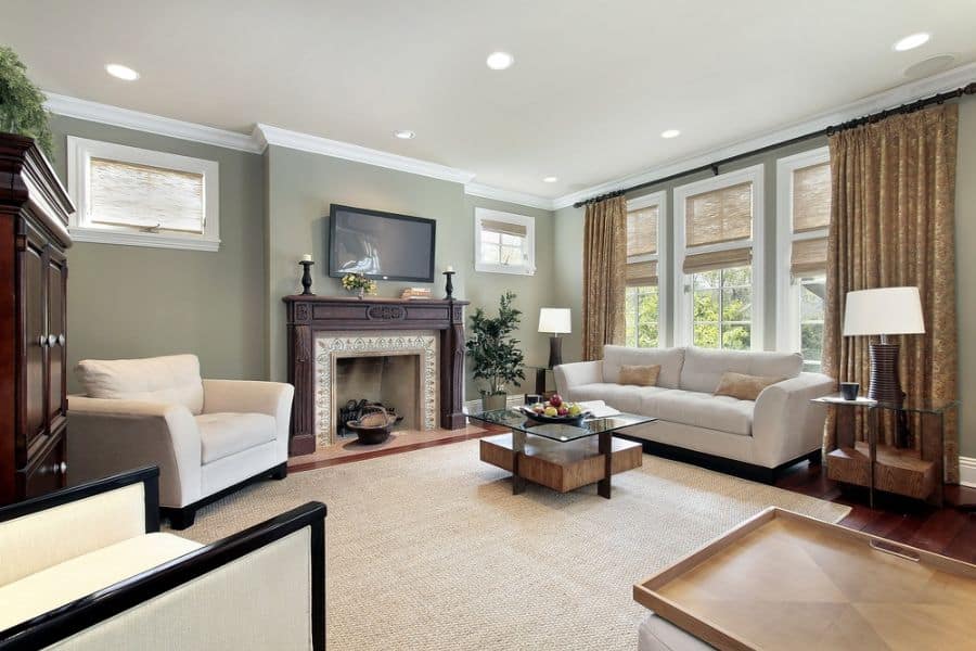 contemporary living room fireplace wall mounted tv thick curtains gray sofa