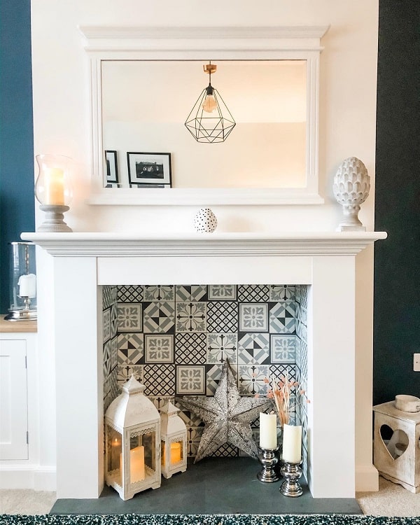 faux fireplace with pattern tiles and candles
