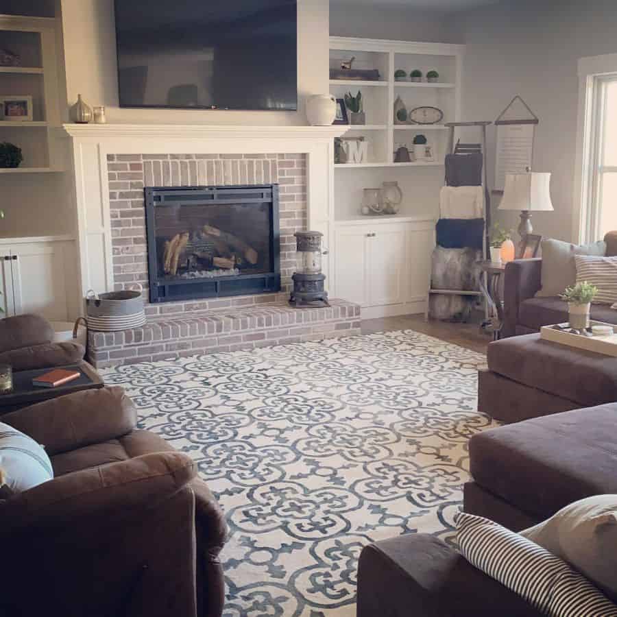 modern farmhouse living room brick fireplace pattern floor rug wall mounted tv