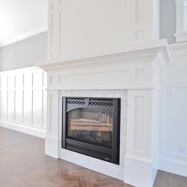 fireplace with millwork wainscoting