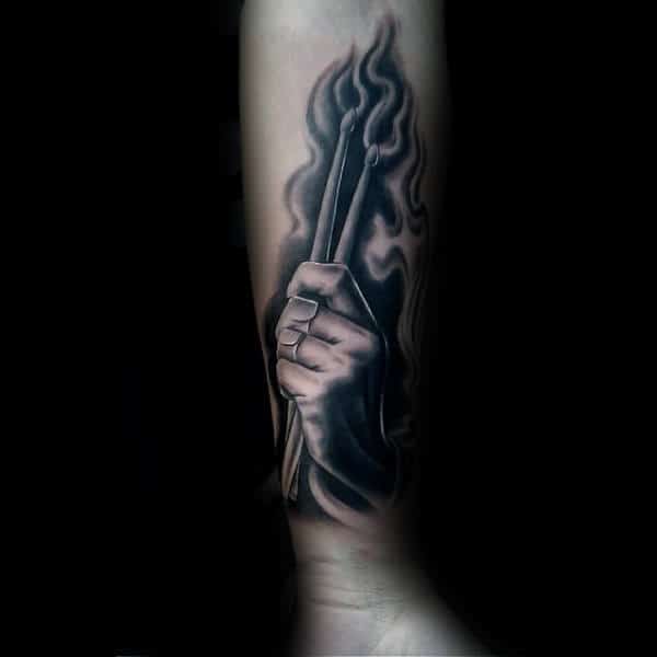 Flaming Drum Sticks Forearm Tattoos For Men