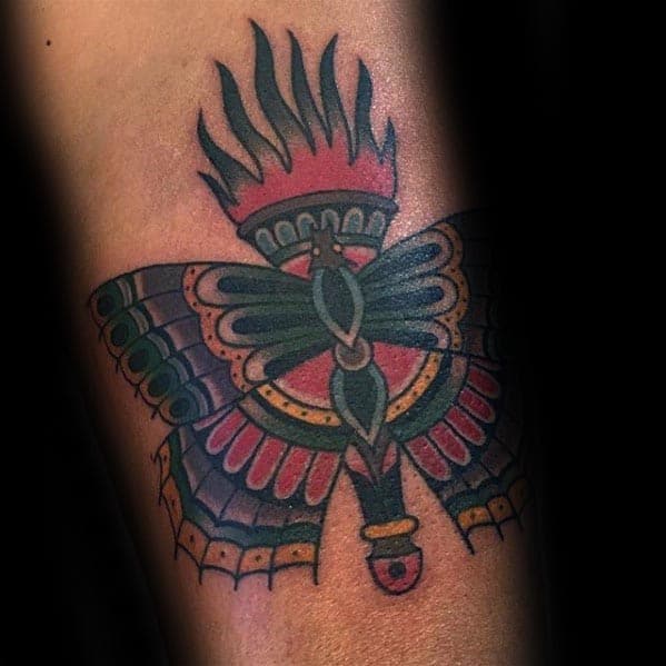 Flaming Lamp With Moth Traditional Arm Tattoo For Guys