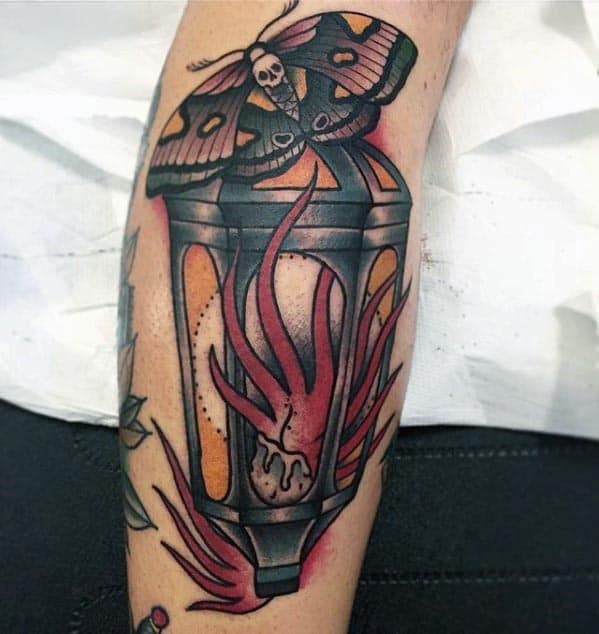 Flaming Lantern With Moth Traditional Mens Arm Tattoo