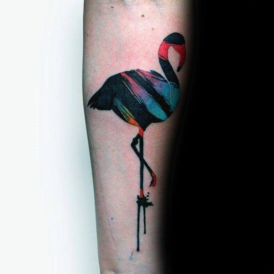 Minimalist flamingo tattoo with bold black shading, abstract colorful streaks, and a dripping ink effect for a modern artistic look.