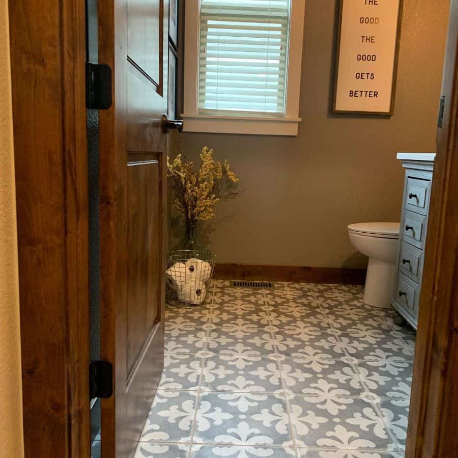 pattern tile floor in rustic powder room