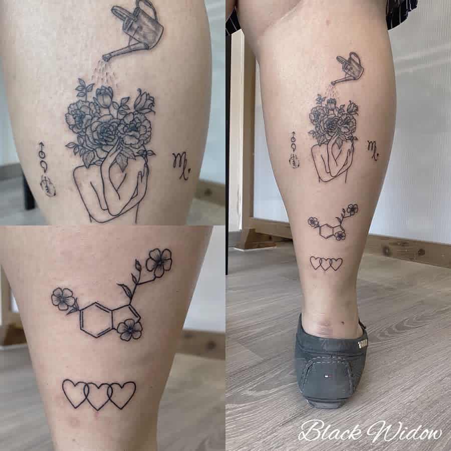 Tattoos of hands with flowers, hearts, a molecule resembling serotonin, and a Scorpio symbol adorn a person's leg