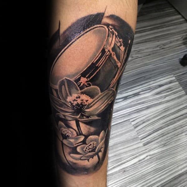 Floral Black Ink Shaded Drum Mens Forearm Tattoo Ideas