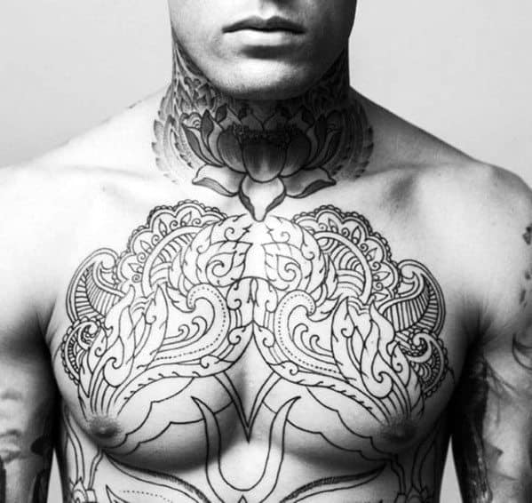 Man with detailed blackwork tattoos on his neck and chest