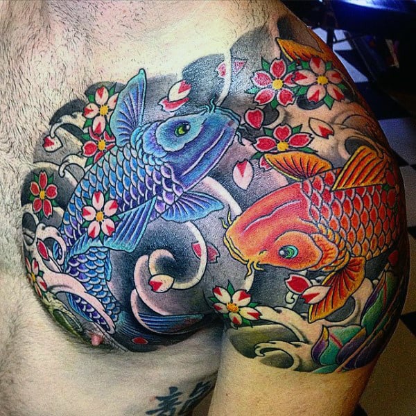 Colorful koi fish tattoo with flowers on shoulder and chest