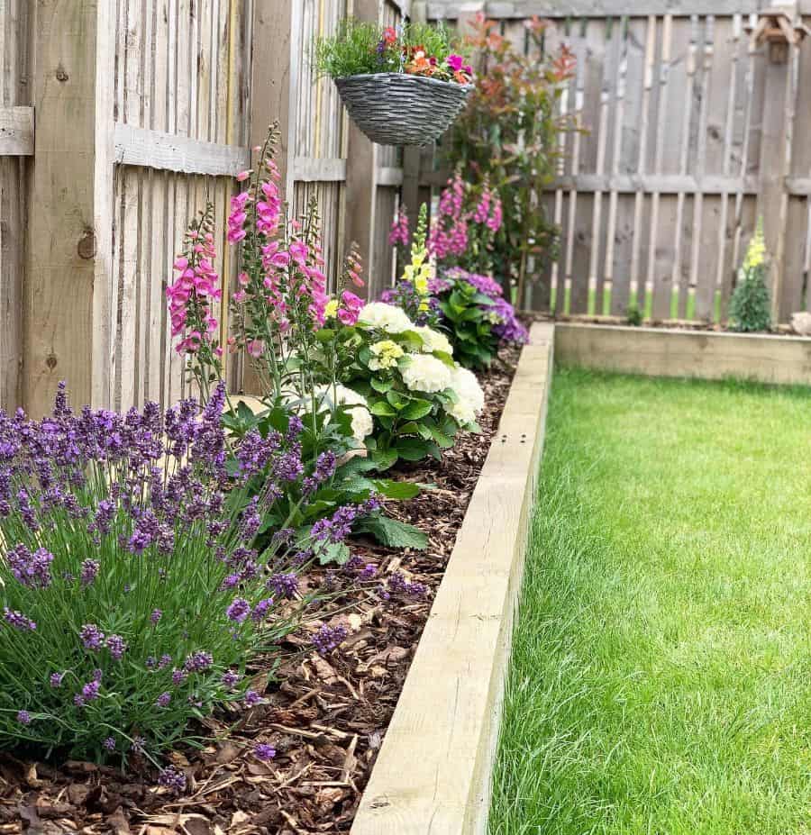 wood fence with garden bed