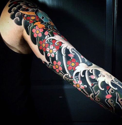 Flowers And Ocean Water Tattoo