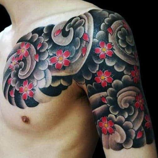 flowers-blowing-in-wind-japanese-cloud-mens-chest-and-half-sleeve-tattoo