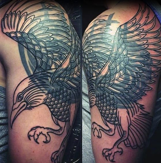 Blast over tattoo of a detailed eagle on someone's shoulder and upper arm