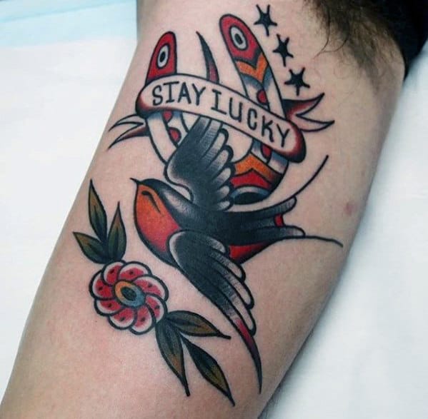 Flying Sparrow With Horseshoe Mens Traditional Inner Arm Bicep Tattoo