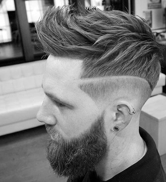 Fohawk Skin Fade Haircut For Men With Wavy Thick Hair