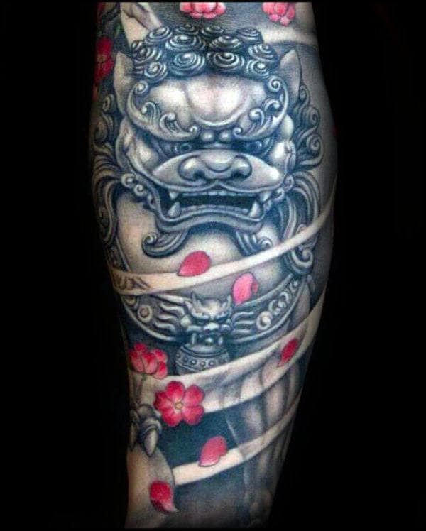 Foo Dog With Flower Petals Mens Sleeve Tattoo
