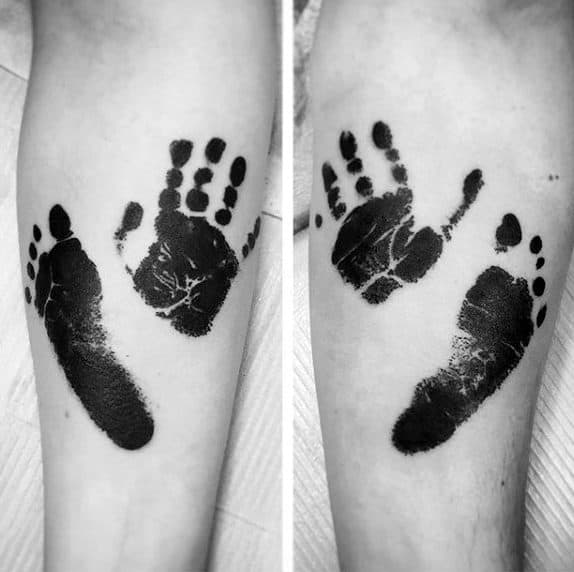 Foot And Handprint Mens Inner Forearm Black Ink Tattoo Designs