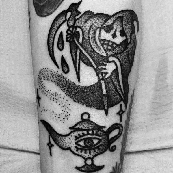 Black ink tattoo of Grim Reaper, genie lamp with eye, and stars