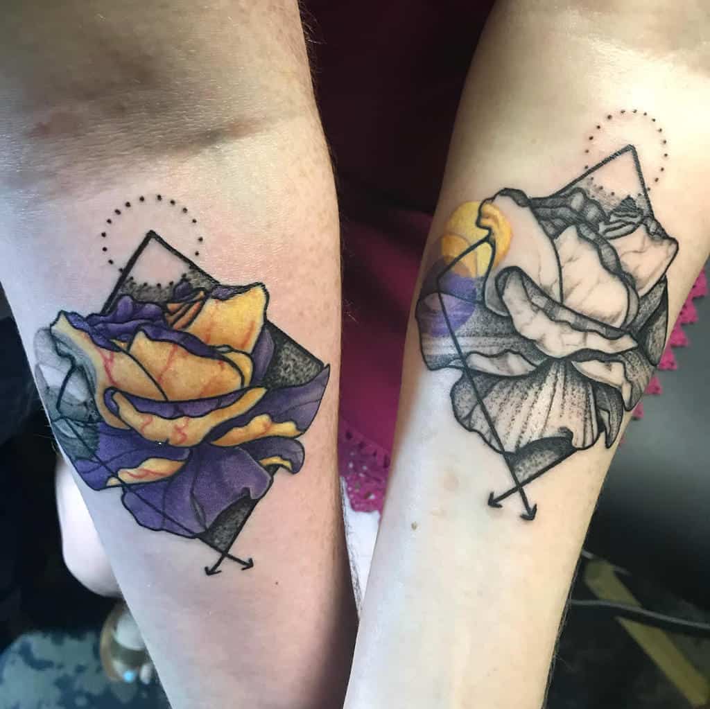 Two forearm tattoos of stylized roses with geometric elements and dotted designs